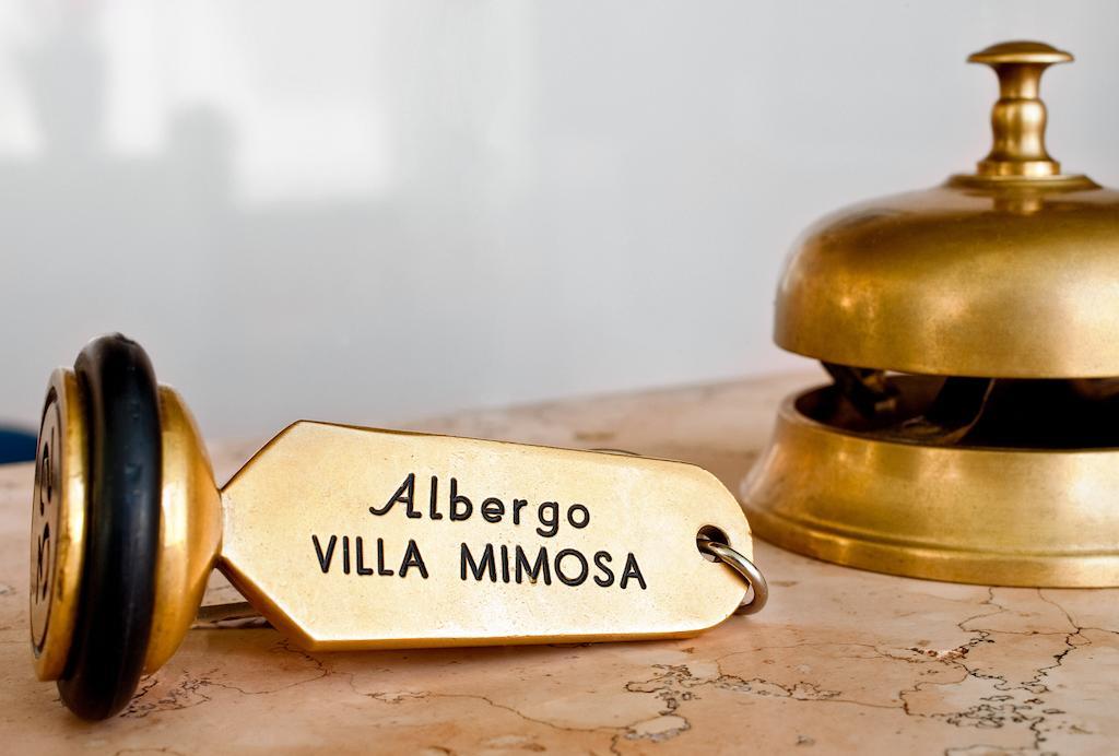 Albergo Villa Mimosa Torbole Sul Garda Oda fotoğraf
